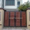 Cổng sắt 4 cánh giả gỗ sang trọng - Tập Đoàn Việt cong sat 4 canh gia go 1